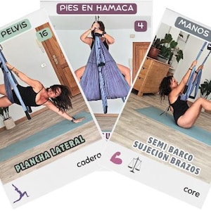 Puede incluir: Tres tarjetas instructivas de yoga aéreo con una persona en traje de baño negro realizando posturas con una hamaca de tela morada. Las tarjetas incluyen etiquetas como TELA EN PELVIS, PIES EN HAMACA, MANOS E3 SUELO, PLANCHA LATERAL y SEMI BARCO SUJECIÓN BRAZOS, junto con iconos numerados y símbolos que representan fuerza central y equilibrio.