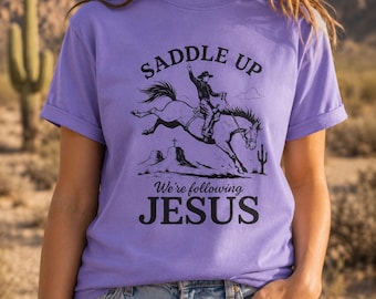 Saddle Up We’re Following Jesus Shirt, Christian Western Tee, Faith Cowgirl Shirt, Jesus Graphic T Shirt, Rustic Religious Apparel