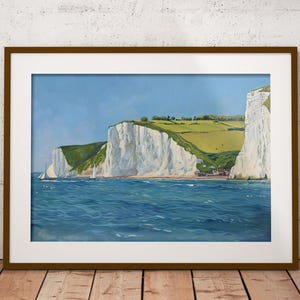 May include: A painting depicting white cliffs along a coastline with a sailboat on the water. The cliffs are tall and dramatic, and the water is a deep blue. The sky is a light blue with some clouds.