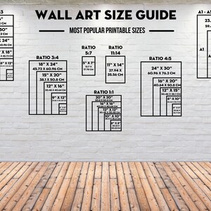 May include: A white brick wall with a black and white chart showing different wall art sizes and ratios. The chart includes measurements in inches and centimeters. The chart is titled "Wall Art Size Guide" and "Most Popular Printable Sizes".