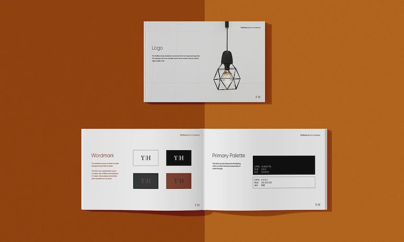 May include: A design presentation on a burnt orange background. The top page shows a black geometric pendant light. The bottom page is open, displaying a wordmark and primary palette with the letters "YH".