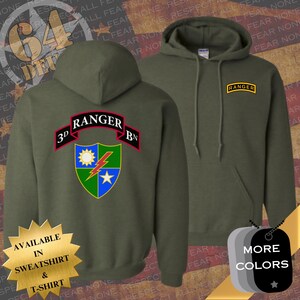 May include: Two olive green hooded sweatshirts. One features a crest with a sun, lightning bolt, and star, with "3D RANGER BN" above. The other has a "RANGER" patch. Available in sweatshirt and t-shirt.