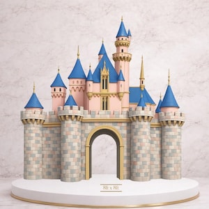 May include: A miniature pink and blue castle with multiple turrets and spires. The castle has a gold arched entrance and is set on a white platform with gold trim. The text "8ft x 8ft" is at the base.