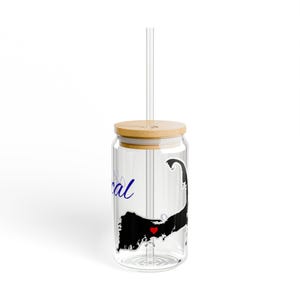 May include: A clear glass tumbler with a wooden lid and a clear straw. The tumbler features a black graphic of a coastline with a red heart and the word "local" in blue script.