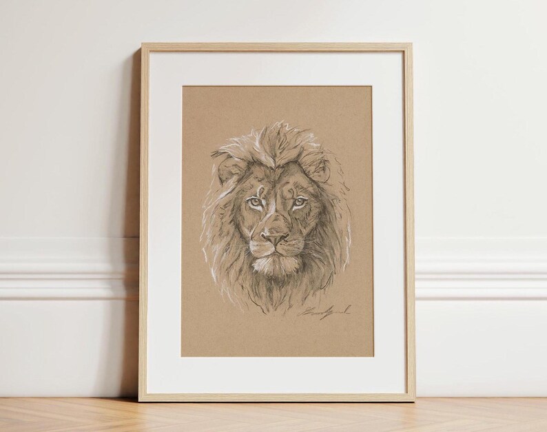 May include: A black and white pencil drawing of a lion's head with a detailed mane. The lion is looking directly at the viewer with a serious expression.