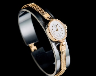 Reloj Chaika vintage con caja, cadena de seguridad chapada en oro, años 90, mecánico. ¡Nuevo! ¡Sin usar!