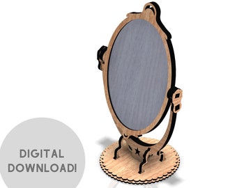 May include: A wooden cutout of a vanity mirror with a star design on the base. The mirror is oval shaped and has a decorative top. The image includes the text "DXF/SVG/CDR/PDF" and shows file icons for these formats.