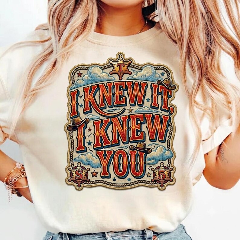 Retro western-style typography design featuring the phrase “I Knew It, I Knew You” in bold vintage red and orange lettering with blue shadows. The artwork includes cowboy hats, sheriff badges, stars, clouds, rope border details, and a rustic cowboy theme, making it ideal for a 5th birthday shirt, western birthday party, family matching apparel, and print-on-demand products.