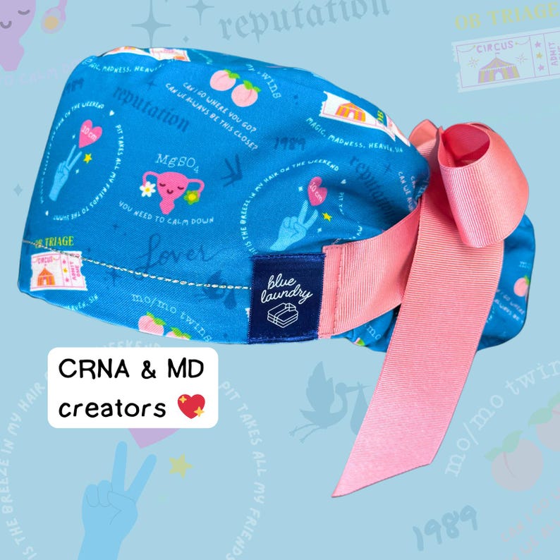May include: Blue and pink patterned surgical scrub hat with a pink bow. The hat has a variety of designs including peaches, hearts, peace signs, and the text "reputation", "MgB04", "Lover", "mo/mo twins", "1989", "Magic Madness", "Heavier Than Heaven", "Can I Go Where You Go?", "Can We Always Be This Close?", "Blue Laundry", "CRNA & MD creators", and "Pit Takes All My Friends".