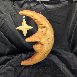 Hand Carved Sleeping Moon Ornament