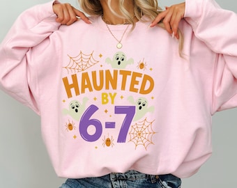 Haunted By 6-7 Halloween Sweatshirt, Spooky Season Sweatshirt,Scary Social Media Trend,Pumkin Ghost Sweatshirt,Gift for Halloween