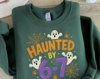 Haunted By 6-7 Halloween Sweatshirt, Spooky Season Sweatshirt,Scary Social Media Trend,Pumkin Ghost Sweatshirt,Gift for Halloween