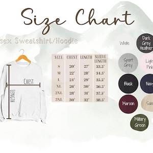 May include: A white unisex sweatshirt/hoodie displayed on a hanger, with a size chart and color options. The chart lists chest, length, and sleeve length measurements in inches for sizes S to 3XL. Color options include white, grey, black, navy, and more.