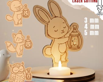 May include: Wooden laser-cut candle holders featuring a bear, fox, owl, and rabbit holding lanterns. The rabbit holds a lit candle. Text on the image reads "DIGITAL FILE FOR LASER CUTTING" and "3 mm, 4 mm, 5 mm, DXF, SVG, AI, PDF, CDR".