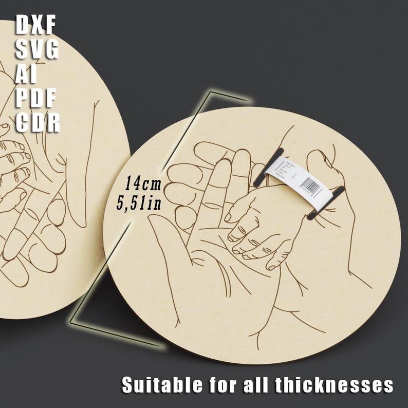 May include: Two light-colored wooden circles with a hand-drawn design of adult and child hands holding each other. The text "DXF SVG AI PDF CDR" is in the upper left. The text "14cm 5.51in" is near the center. The text "Suitable for all thicknesses" is at the bottom.