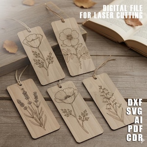 Puede incluir: Cinco marcadores de libros de madera con dise&ntilde;os florales grabados, incluyendo amapolas y lavanda. Cada marcador tiene una cuerda para colgar. El texto "DIGITAL FILE FOR LASER CUTTING" y abreviaturas de tipo de archivo son visibles.