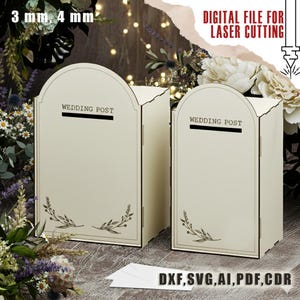 May include: Two cream-colored wedding post boxes with arched tops and a slot for cards. Each box has the words "WEDDING POST" printed on the front. The boxes are decorated with floral designs and the text "DIGITAL FILE FOR LASER CUTTING" and "DXF, SVG, AI, PDF, CDR".