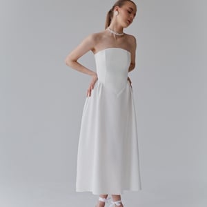 Basque waist wedding dress , strapless wedding dress , corset wedding dress , drop waist wedding dress , short wedding dress .