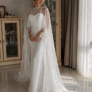 chiffon cape sleeve maxi bridesmaid dress Amazon.com: SiLidressy Chiffon Bridesmaid Dress with Chiffon Cape Formal  Gown Evening Dress with Shawl for Wedding Party White 2 : Clothing, Shoes &  Jewelry