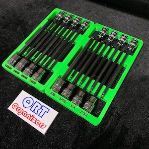 Puede incluir: Un juego de llaves de vaso negras y plateadas en una bandeja organizadora verde brillante. La bandeja está etiquetada con tamaños en pulgadas y milímetros. También hay una etiqueta blanca con el texto "ORT Organizers".