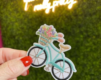Parche bordado de bicicleta floral