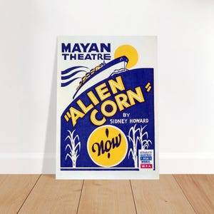 May include: A vintage poster for "Alien Corn" at the Mayan Theatre. The poster features a blue and yellow color scheme with a stylized ship, sun, and corn stalks. Text includes "Alien Corn" and "Now".