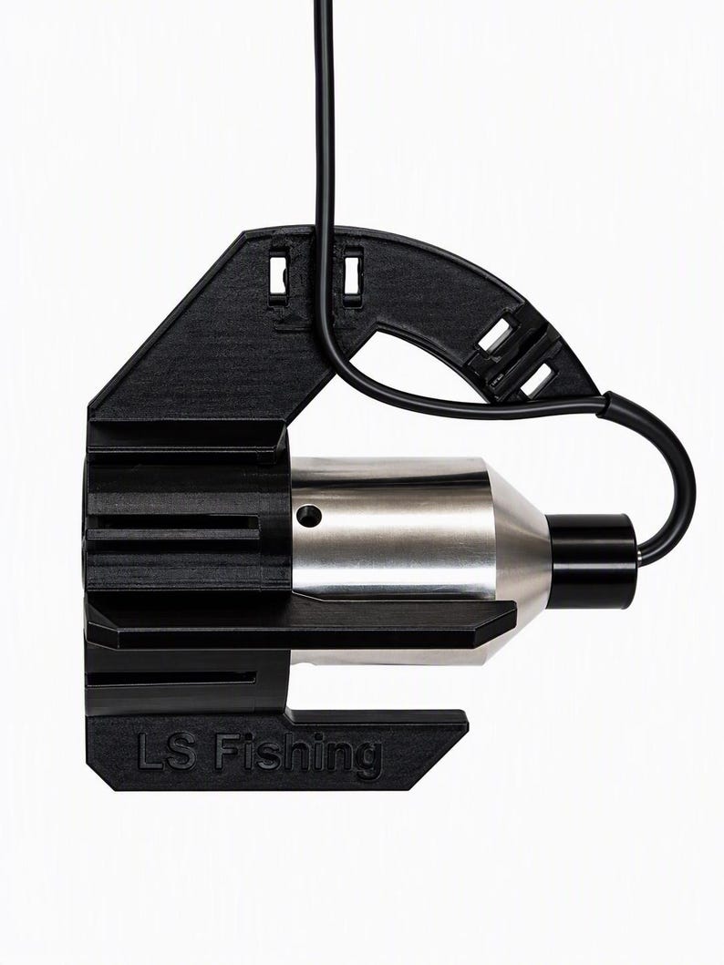 Side view of the black anti-spinner on a stainless Carplounge Winchcam camera, cable looped through the front clip so the camera looks straight ahead
