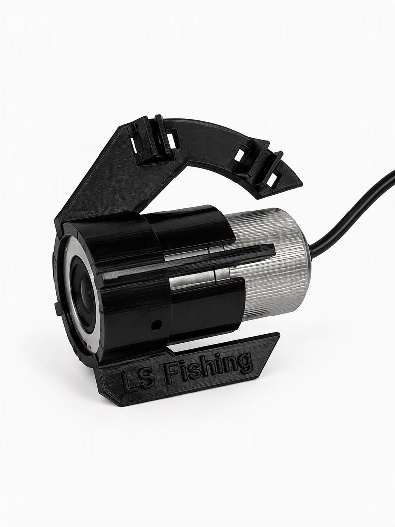 Black Stealthcam UK Winchcam underwater camera clicked into the anti-spinner, with the opening for the temperature sensor and the LS Fishing logo
