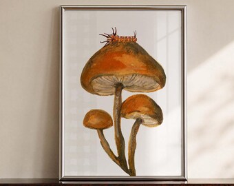 May include: A framed vertical print featuring a watercolor illustration of three brown mushrooms with a small orange caterpillar resting on the cap of the largest mushroom. The artwork is set against a plain white background within a silver frame.
