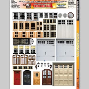 May include: A sheet of pre-cut decals for model railroading. The decals feature various doors and windows in different styles and sizes, including garage doors, double doors, and single windows. The decals are printed on a clear, adhesive-backed material and are suitable for use on most scales.