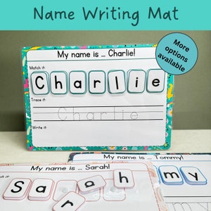 May include: A colourful name writing mat with a turquoise background and white letters. The mat has three sections: match it, trace it, and write it. The mat is designed to help children learn to write their names. The mat features the name "Charlie" and the text "My name is... Charlie!"