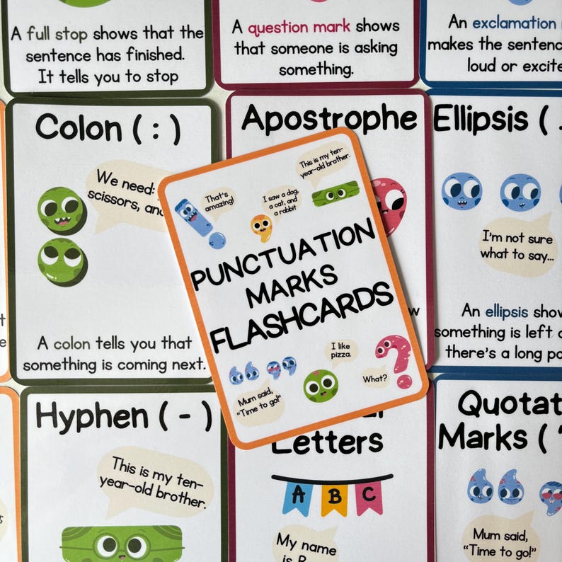 May include: A set of punctuation marks flashcards with an orange border. The central card reads "PUNCTUATION MARKS FLASHCARDS." Other cards show examples of punctuation like colons, apostrophes, and hyphens, with illustrations and text.