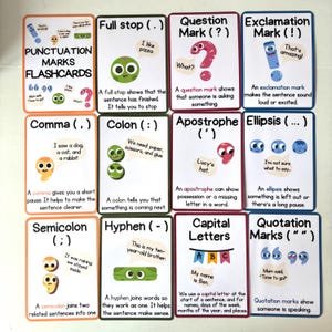 May include: A set of colorful punctuation marks flashcards. Each card features a different punctuation mark, such as a comma, question mark, or exclamation point, with a brief explanation and example sentence. The cards are designed for educational purposes.