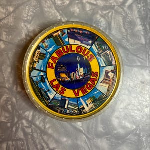 Vintage circular Las Vegas playing cards with plastic case