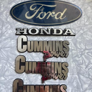 set of 5 car decals, Cummins, Ford and Honda