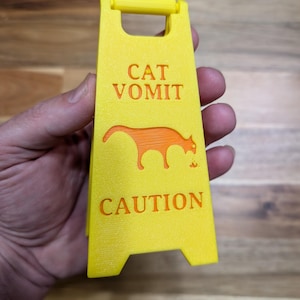 3D Printed &quot;Cat Vomit&quot; Caution Sign