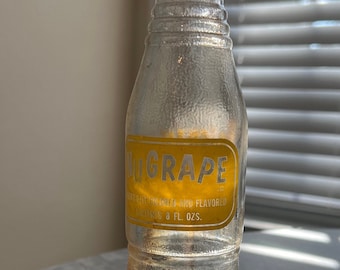 Nugrape glass bottle