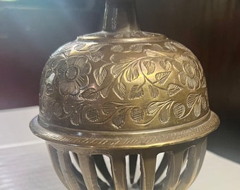 brass vintage elephant bell with hand carved floral design