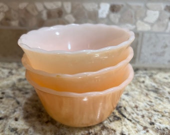 set of five peach lusterware FireKing custard cups
