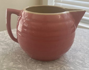 Watts Pottery 1940s rose colored stoneware pitcher