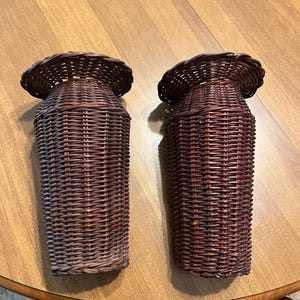 set of two vintage brown wicker woven wall hanging vases