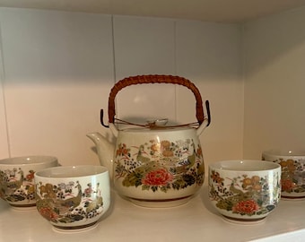 Sanford Japan peacock and floral teapot and 4 cups porcelain vintage unused set with wicker handle