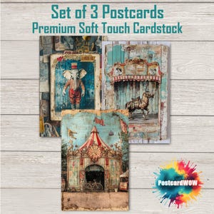 以下が含まれることがあります： ヴィンテージサーカスをテーマにした3枚組ポストカード。サーカスの衣装を着た象、メリーゴーランドの馬、サーカスのテントのイラストが描かれています。「Set of 3 Postcards Premium Soft Touch Cardstock」の文字が上部にあります。