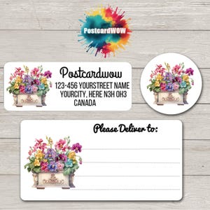 May include: White address labels and stickers with a floral design. The labels feature a rectangular and a circular shape, with a watercolor illustration of colorful flowers in a decorative planter. The text "Postcardwow" and address details are printed on the label.