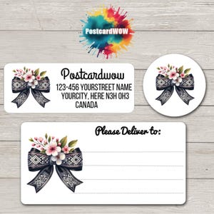 May include: Address labels and a round sticker with a floral bow design. The labels include the text "Postcardwow" and "Please Deliver to:". The bow has a black and white pattern with pink flowers.