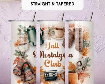 May include: A set of three 20 oz. tumbler wraps with a fall theme. The designs feature watercolor illustrations of coffee cups, a sweater, leaves, and the text "Fall & Nostalgia Club". Each tumbler has a silver straw.