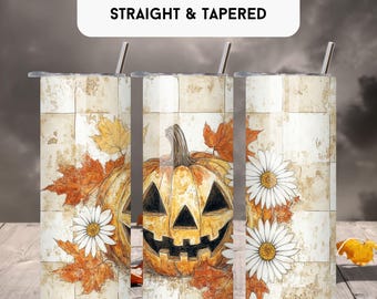 May include: Three 20 oz tumblers with a Halloween theme. Each tumbler features a jack-o'-lantern, fall leaves, and white daisies against a cream-colored, tiled background. The tumblers have silver straws and lids, with the text "20 OZ TUMBLER WRAP STRAIGHT & TAPERED".