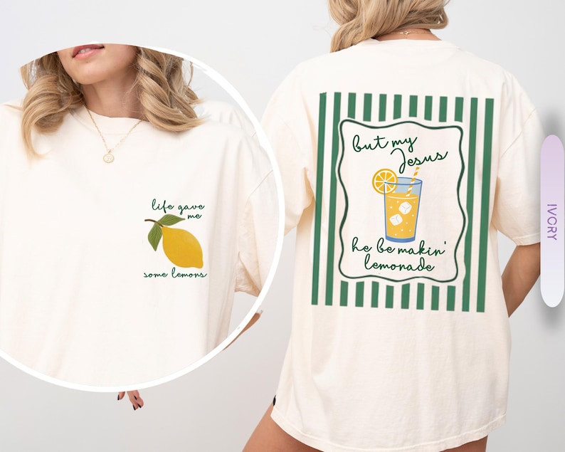 May include: Ivory-colored t-shirt with a lemon graphic and the text "life gave me some lemons" on the front. The back features a lemonade graphic with the text "But my Jesus he be makin' lemonade."