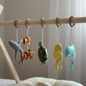 Play gym hanging toys Wooden hanging toys Felt montessori play gym Baby shower and newborn gift Pregnancy gift Toddler activity centre toys