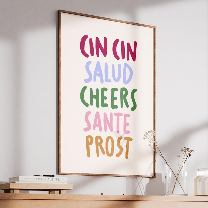 May include: A set of three ceramic mugs with a speckled, matte finish in cream, light grey, and dark grey. Each mug has a simple, minimalist design and a rounded handle.